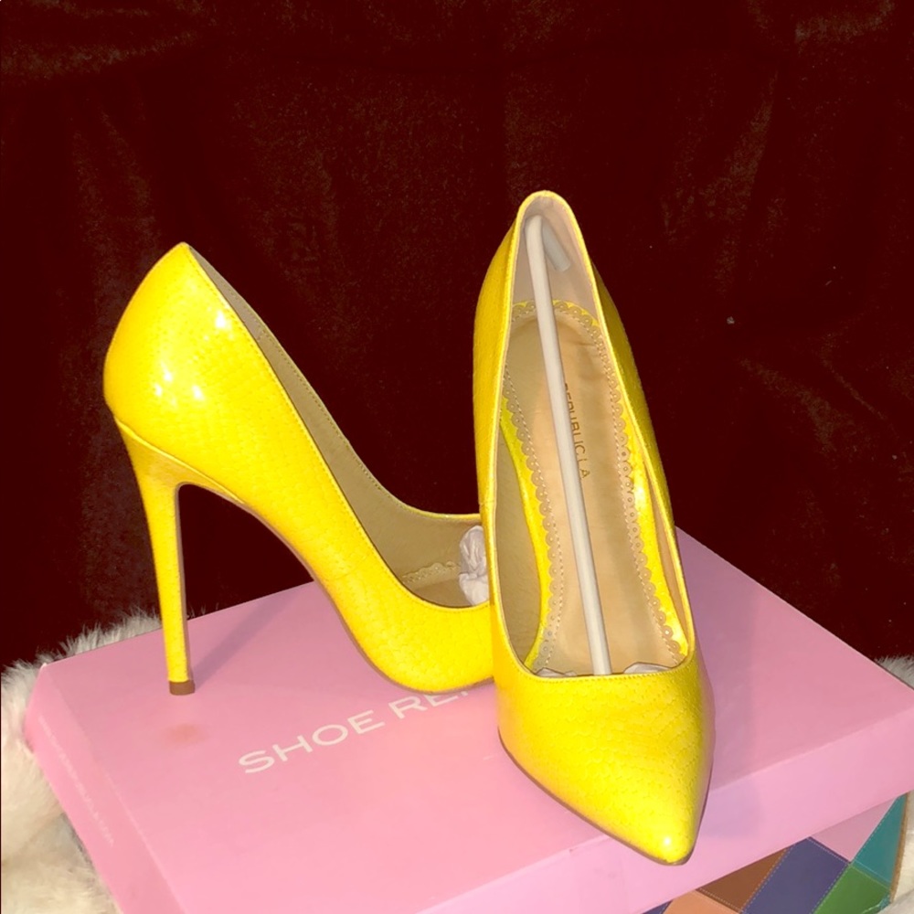 Brand new bright yellow stiletto.